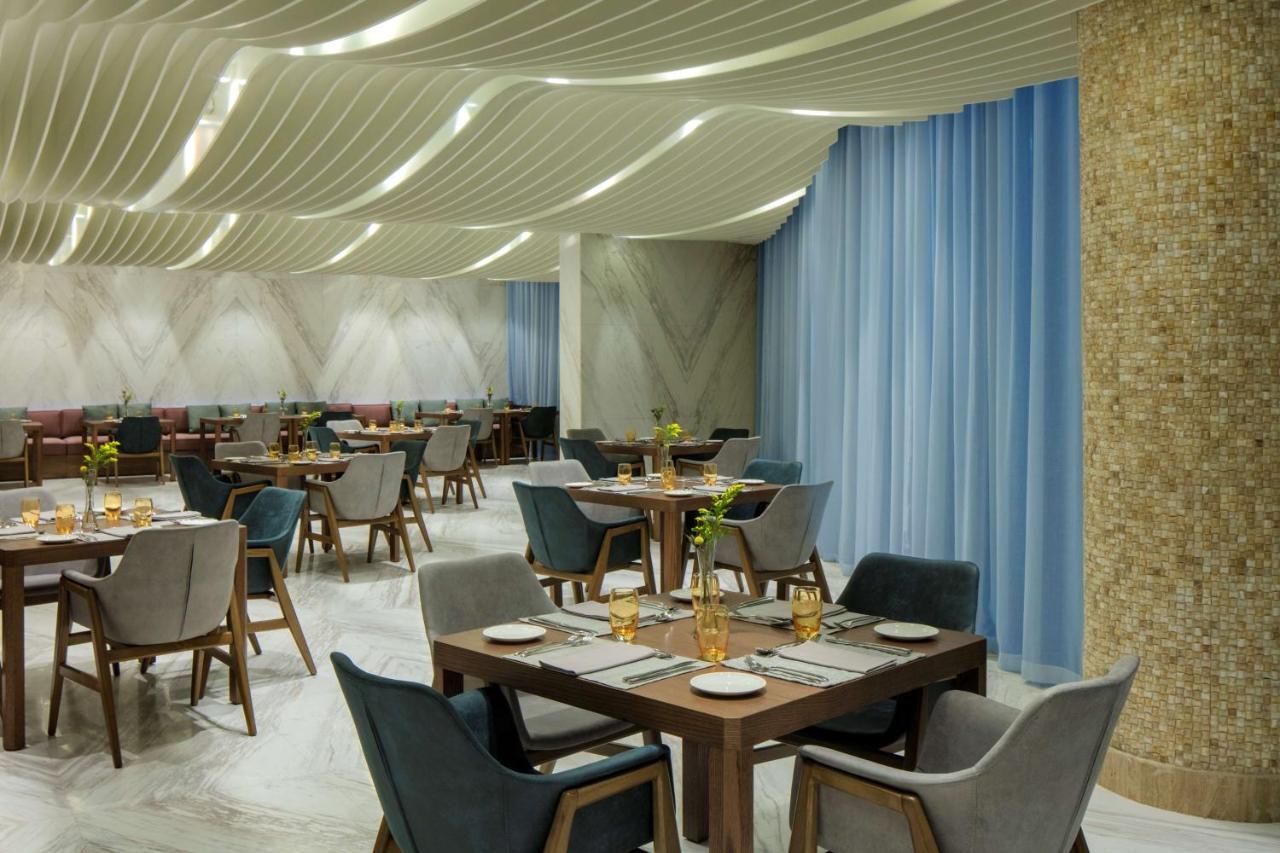 Radisson Blu Hotel Apartment Dubai Silicon Oasis Exterior foto